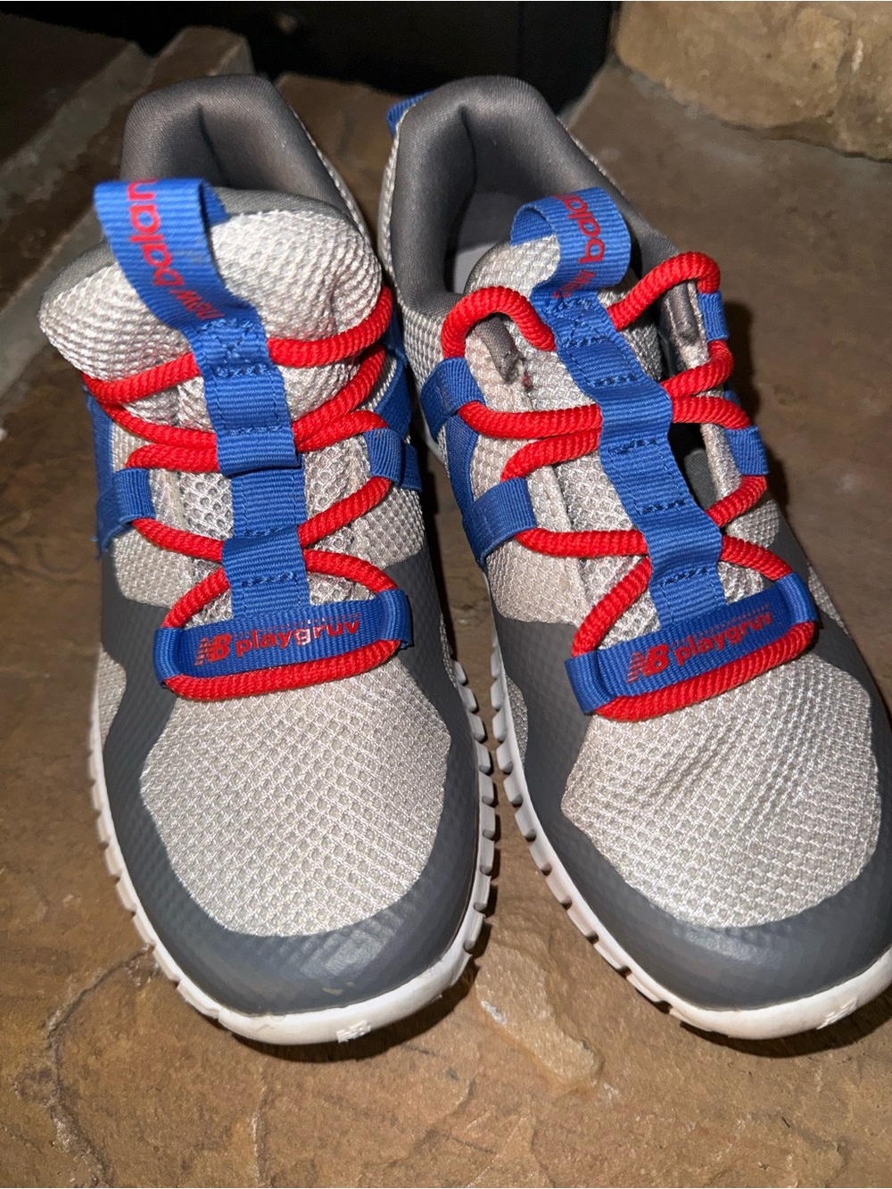 New Balance Kids Gray Sneakers with Blue Straps & Red Laces
